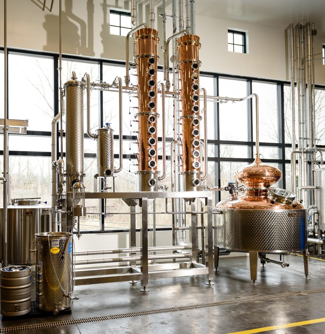 A copper distillation system with two columns.