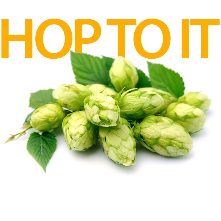 A sign that says "Hop to it" and a pile of fruit in front of it.